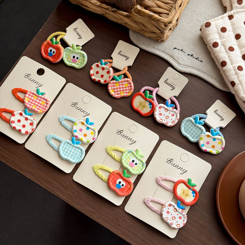 Cartoon-style new resin graffiti apple hair clips, cute and playful hair accessories for little girls, featuring high elasticity for ponytail hairstyles