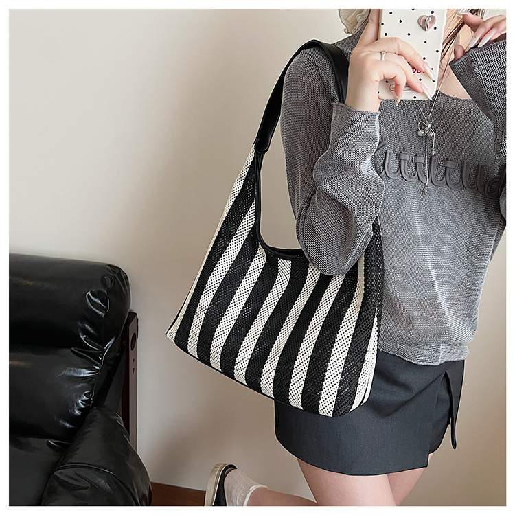 Korean summer new striped woven bag, casual vacation and laid-back style tote bag, hand and shoulder commuter tote bag undefined