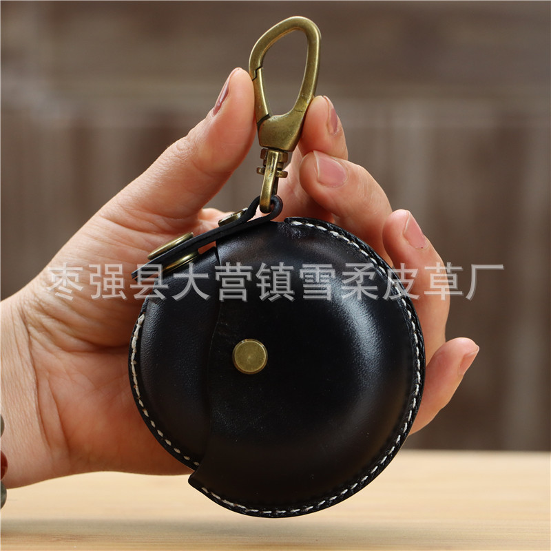 クリエイティブな一層牛革製ハンドメイド小銭入れ、イヤホンケーブル収納バッグ、丸型バッグ、ペンダント、小物入れ、レトロ収納バッグ