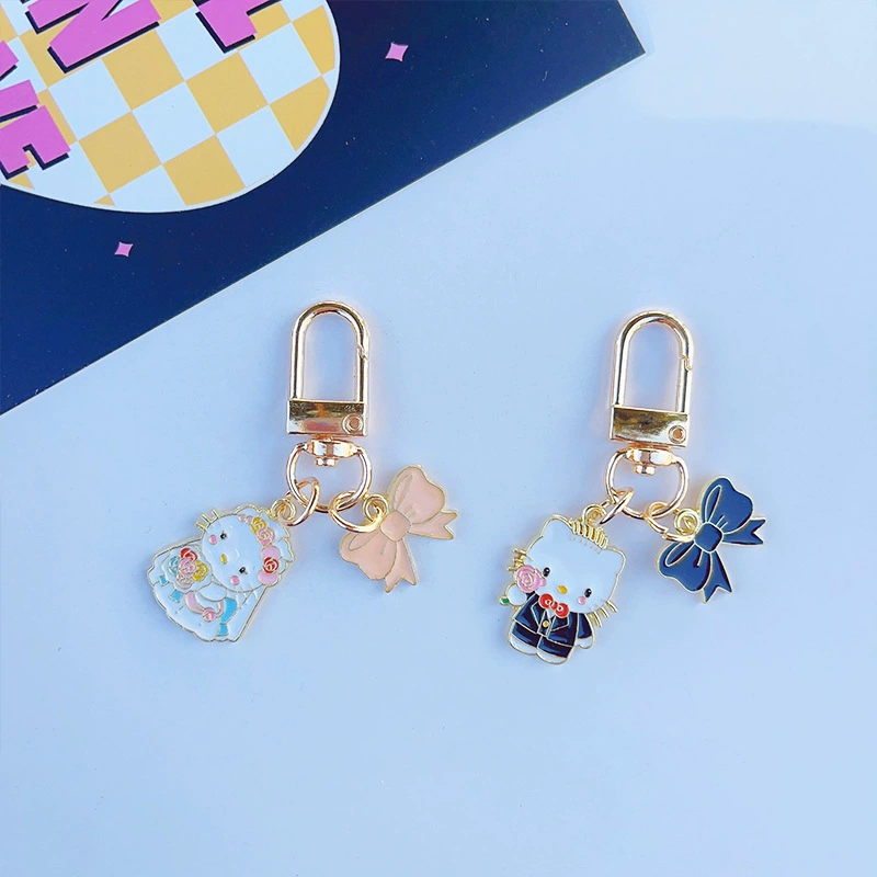 Брелок Hello Kitty свадебная пара эмалированный металл, подвески невеста и жених, 8×6 см