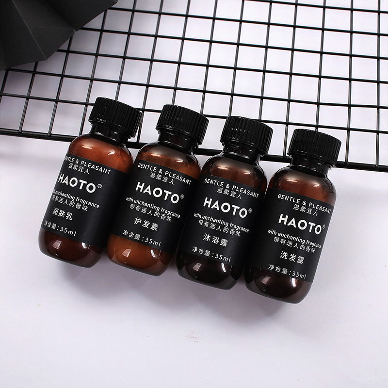 ホテルの洗面用品の卸売り民宿スリッパホテルの柔らかい毛の歯ブラシの使い捨ての歯具のシャンプーの入浴セット