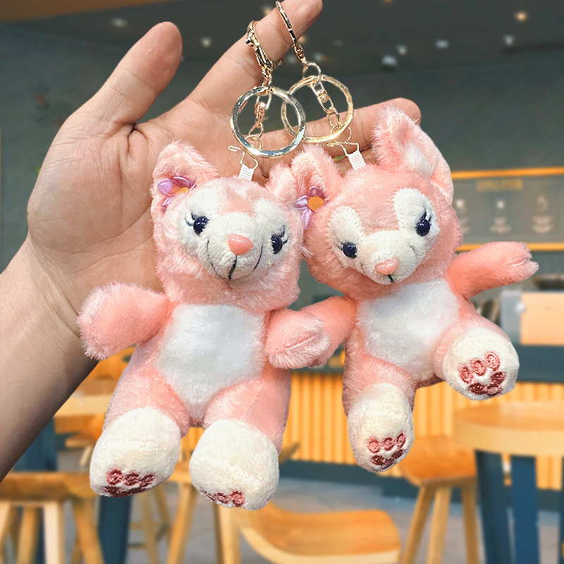 かわいいぬいぐるみのピンクのキツネのキーホルダー卸売りはアニメの人形のキーホルダーのカップルのバッグのペンダントを飾ります。|undefined