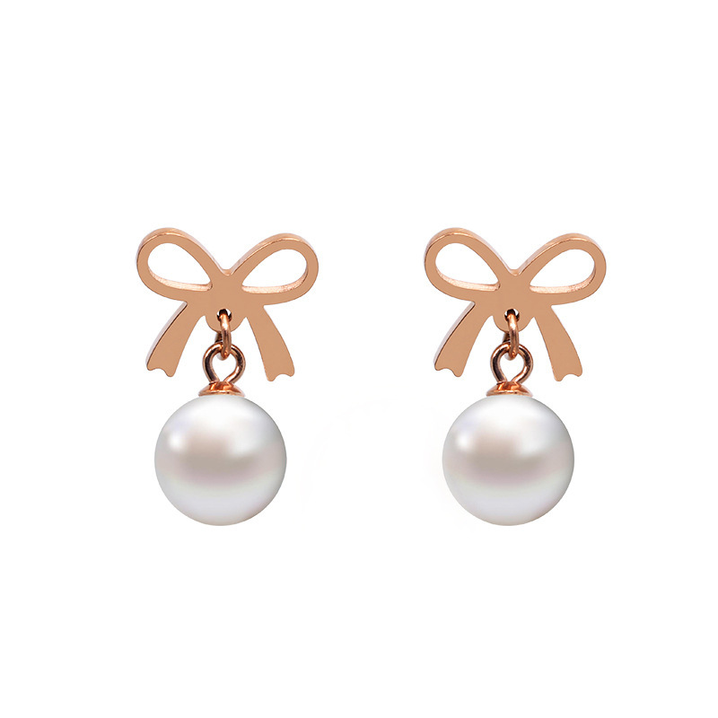 Japonés y coreano elegante moda arco hueco perla Stud pendientes de moda femenina de acero de titanio no se desvanece la joyería del oído transmisión en vivo
