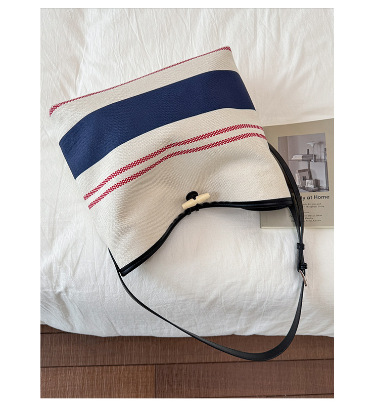 Korean version large-capacity women's 2025 new style fashionable canvas striped single-shoulder underarm bag casual commuting tote bag undefined