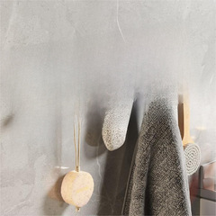 Hook with strong adhesive for bathroom towels, suitable for attaching to walls in toilets or bathrooms, without the need for holes.