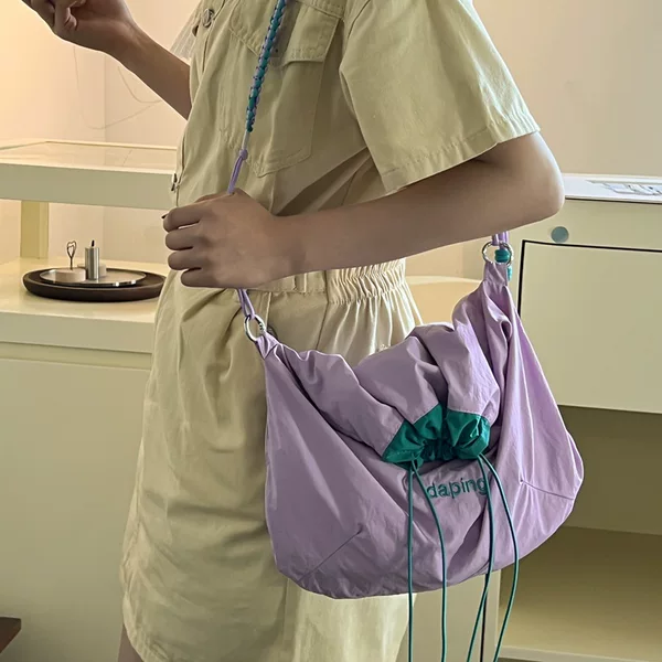 New stylish versatile drawstring crossbody bag, unique and simple, Ruiying single shoulder women's bag, color-blocking lightweight handbag