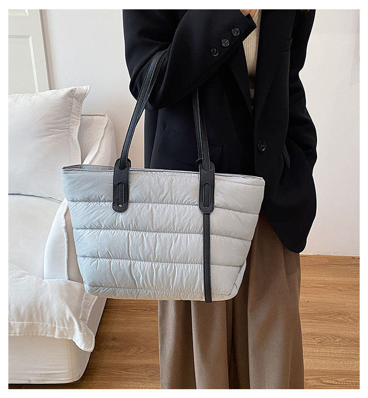 Große Kapazität Cross-Border Baumwoll-Steppjacken-Tasche modische vielseitige leichte Tragetasche Weltraum-Baumwoll-Freizeit-Pendelrucksack Umhängetasche Handtasche
