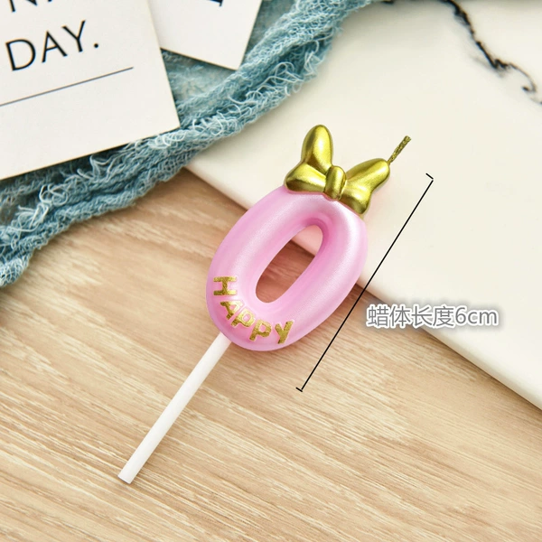 Fuchsia candle with bow
