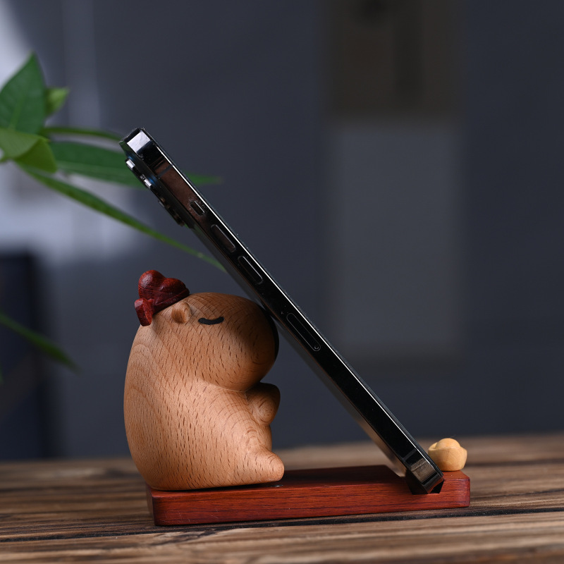 カピバラ便器の実木彫刻磁気はかわいいアイデアを吸収します。|undefined