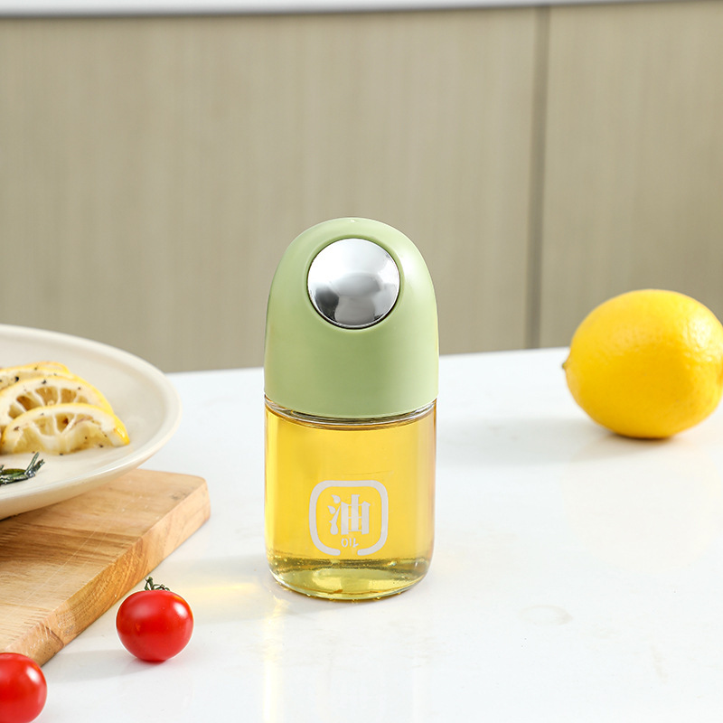 La nueva olla de aceite de vidrio de apertura y cierre automático, botella de condimento de cocina para el hogar, mayor capacidad, boquilla de aceite en forma de gota, tanque de vinagre de salsa de soja