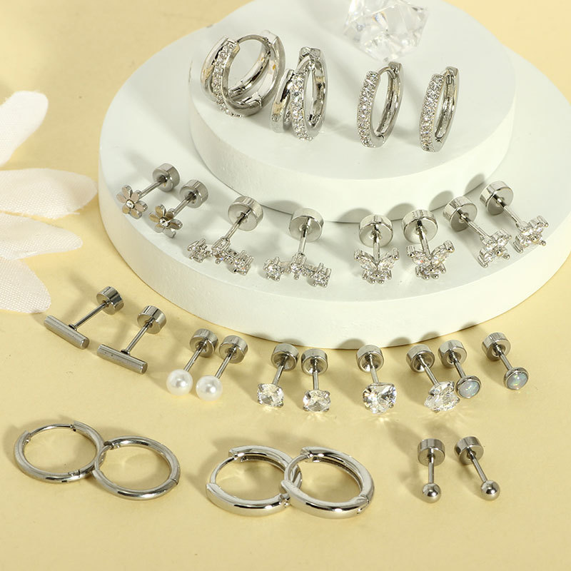 Ensemble de boucles d'oreilles clous et créoles en titane_voghion.com