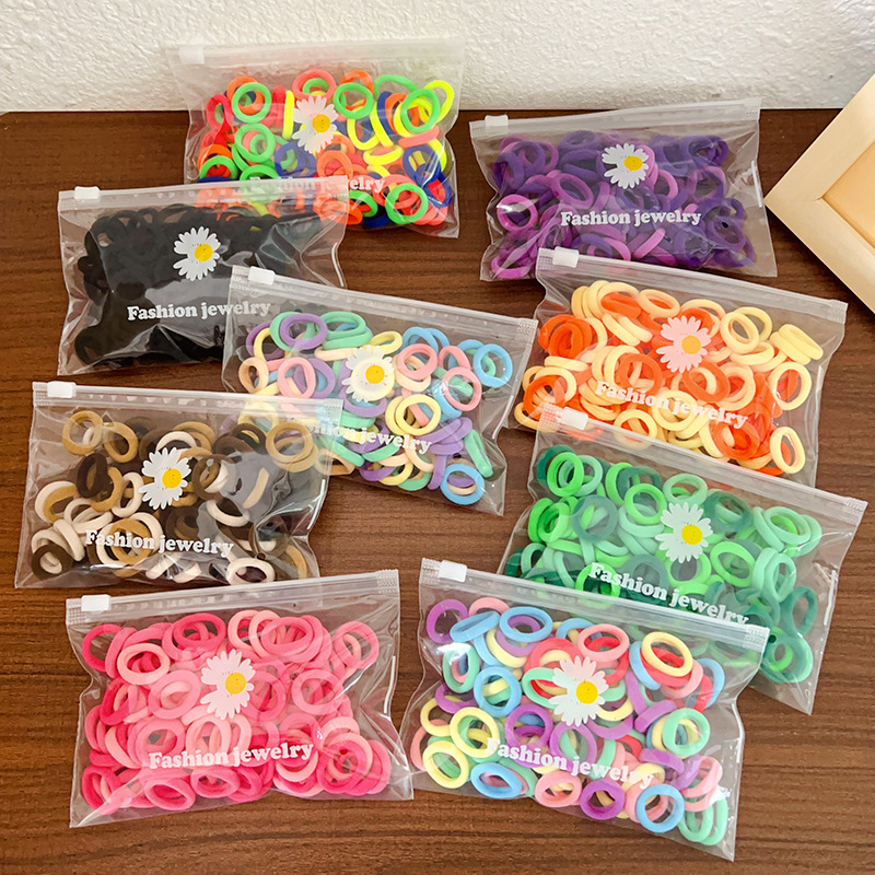 100 margaritas pequeñas para la cuerda de cabeza de la goma de nylon y goma de la toalla, accesorios de moda para el pelo tarta de cuerda para el pelo