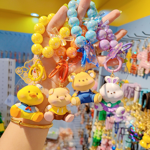 Little rabbit creative face toot little animal keychain pendant female cute couple key chain bag mobile phone pendant wholesale