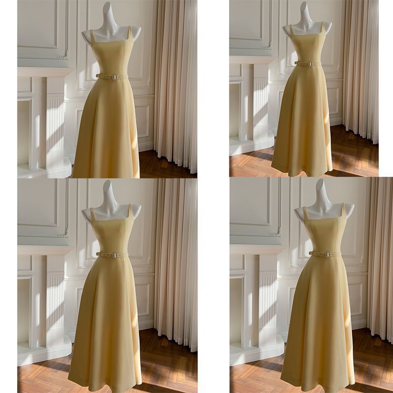 2025夏季新款赫本风黄色简约吊带长裙轻奢感收腰显瘦连衣裙女涤纶