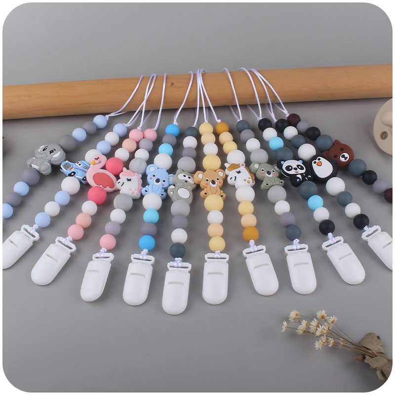 Bebé suministros de dibujos animados animal serie dos conjuntos Bebé dibujos animados unicornio mordedor pezón cadena anti-caída