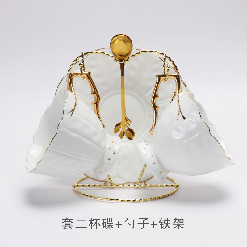 De gama alta de estilo europeo de cerámica taza de café y platillo traje exquisito británico pintura de oro juego de té de la tarde pareja taza de té perfumada