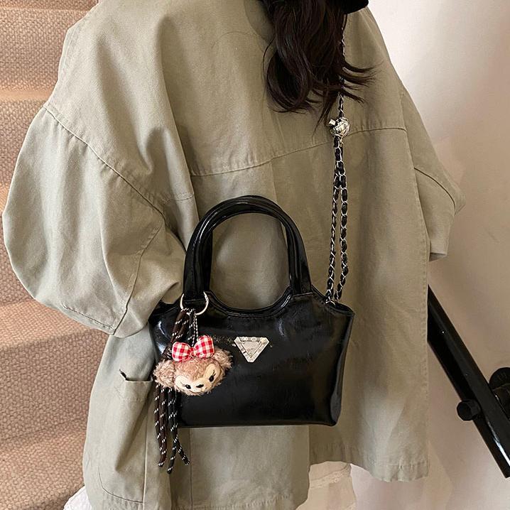 Bolso de mano explosivo transfronterizo para mujeres 2025 primavera nueva cadena de bolso de hombro universal de alta calidad bolso de cubo de agua