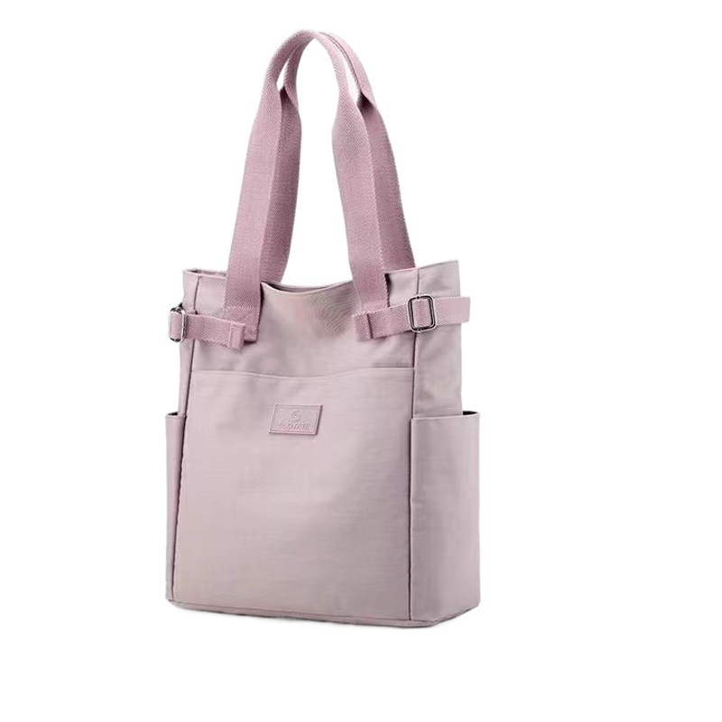 Nuevo bolso de lona, bolso de tela de nailon, bolso informal japonés transfronterizo de gran capacidad con múltiples bolsillos