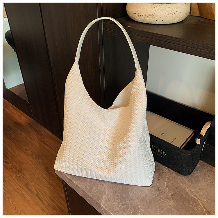 In 2025, a new Korean-style casual woven pattern large-capacity tote bag for women's commuting to work undefined