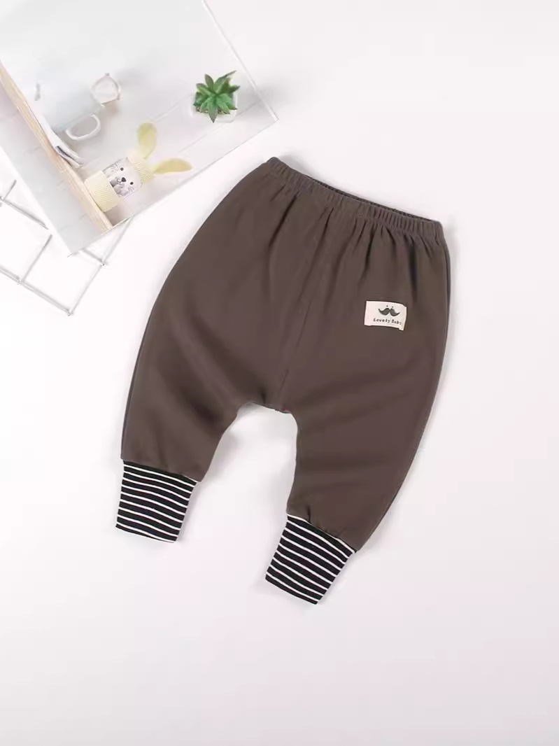 2024 nuevos pantalones costillados para bebés abiertos de color sólido pie a clase pantalones de algodón harun niños 1 - 2 años de pantalones de otoño delgados