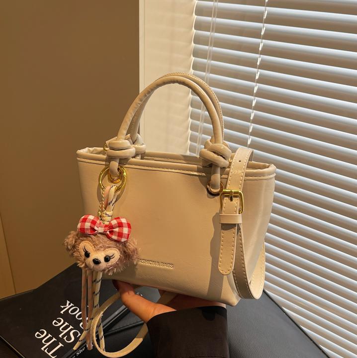 Este año popular bolso de cubo de mano caliente 2025 nuevo bolso de mujer bolso de hombro casual versátil bolso de alta calidad