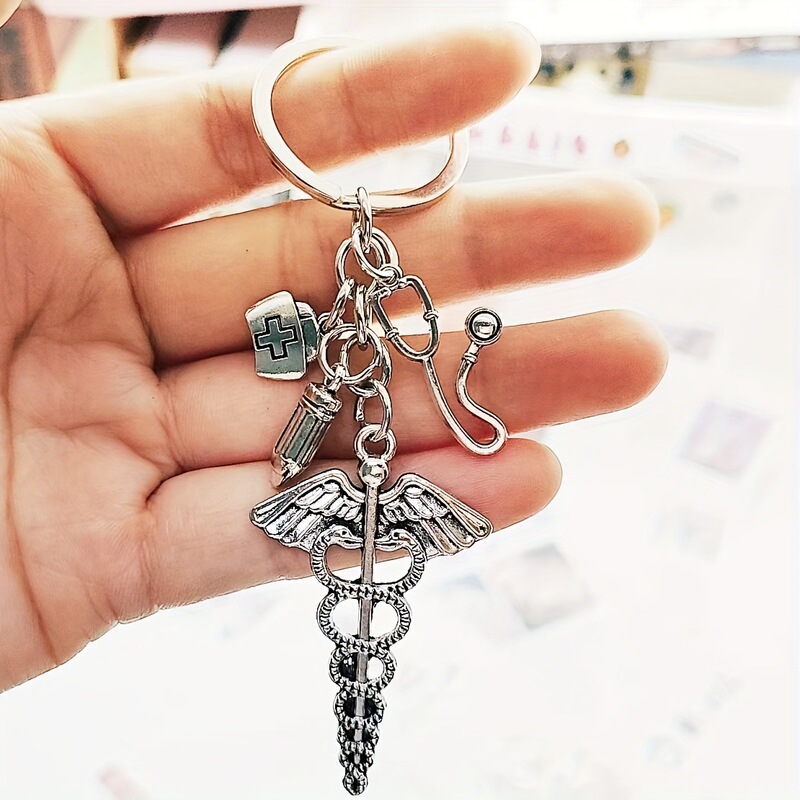 European and American foreign trade jewelry backpack pendant doctor nurse medical emergency rescue personnel heart-shaped angel key chain European and American foreign trade jewelry backpack pendant doctor nurse medical emergency rescue personnel heart-shaped angel key chain