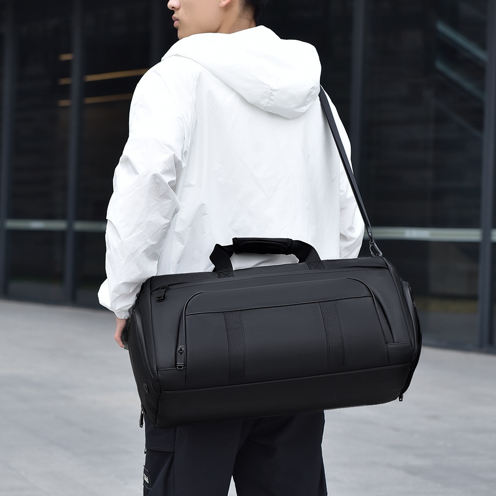 Nuevo paquete de viaje transfronterizo para hombres de alto nivel sensación de bolso de mano versátil a prueba de salpicaduras separación seca y húmeda bolsa de fitness