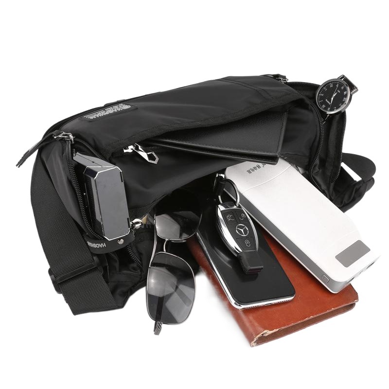 Bolso de pecho de los nuevos hombres bolso de cintura de moda multifuncional Cambio de bolsa de almacenamiento de teléfono móvil bolso de hombro de viaje de moda crossbody bolso de los hombres