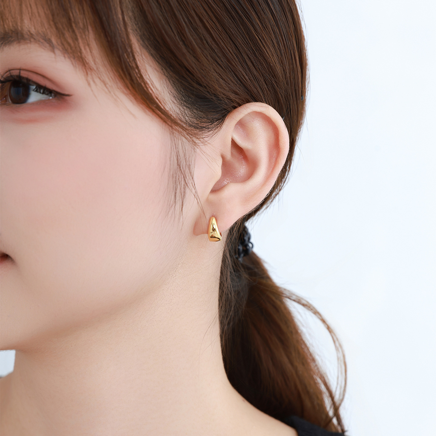 Xuping simple brillante círculo de geometría auricular aleación de cobre chapado 24k color europeo y americano transfronterizo ligero auriculares de lujo al por mayor mujeres