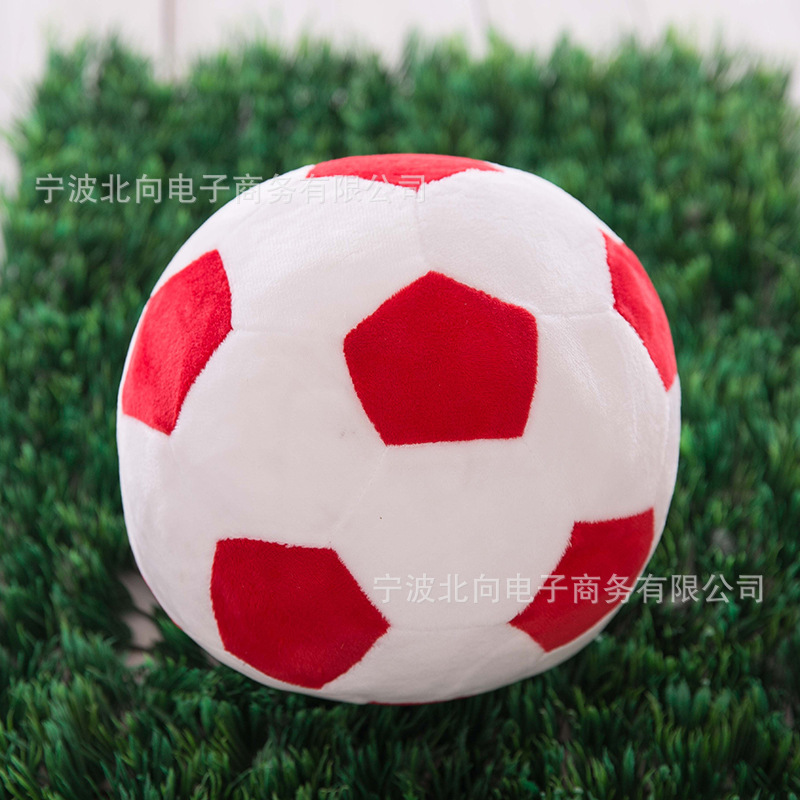 Balón de fútbol rojo y blanco de 18 cm.