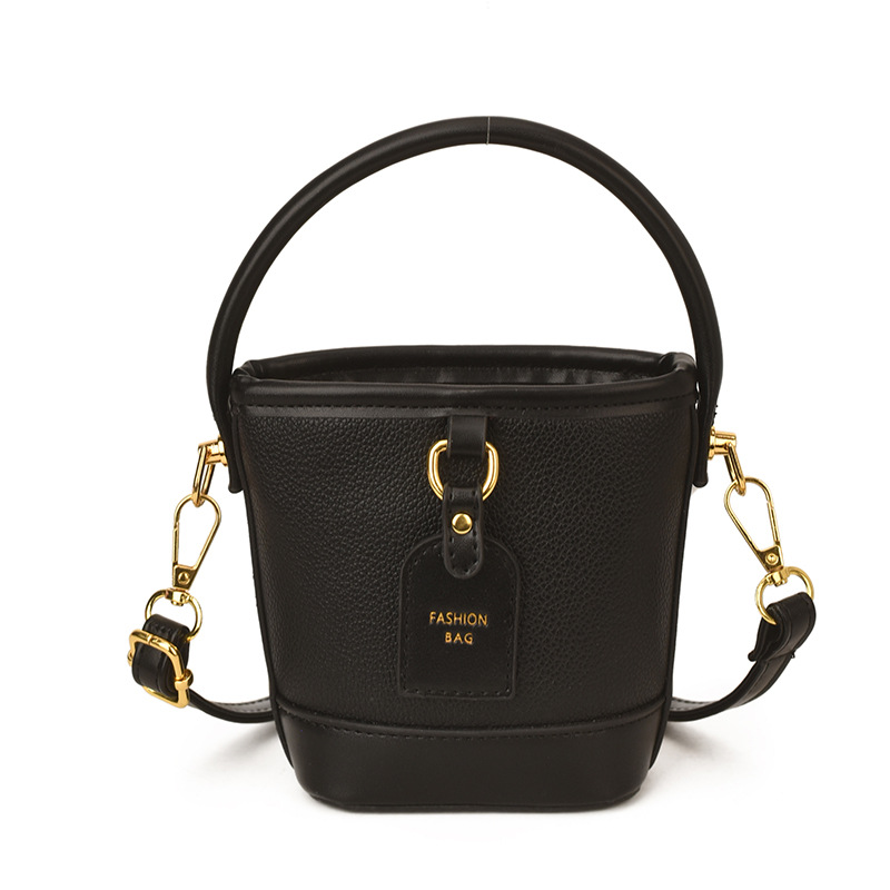 Mini pequeño bolso de cubo de mano para niños 2026 nuevo estilo de alta calidad de moda versátil bolso de mochila de estilo exterior