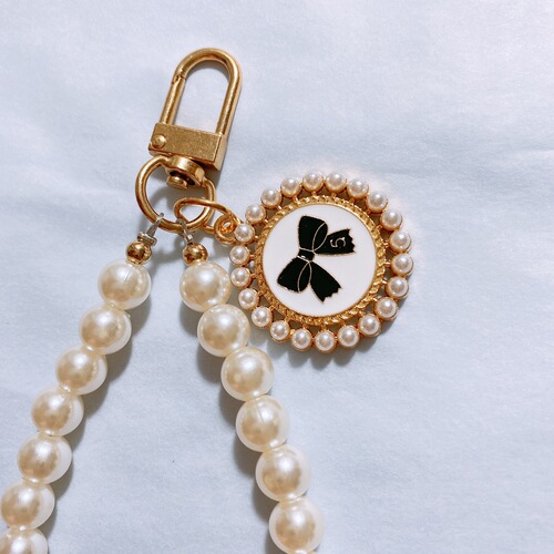 Pearl pendant bracelet, oil-drop shaped round bow pearl phone chain, pearl headphone chain