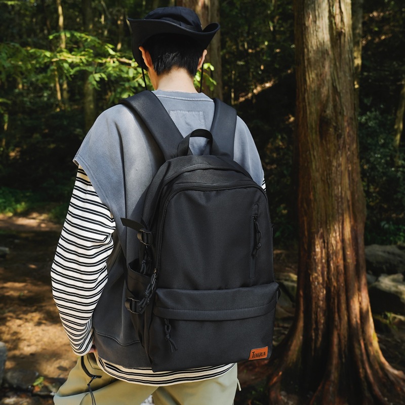 Mochila de nailon de gran capacidad de marca de moda 2024 mochila nueva simple universidad escuela secundaria escuela secundaria estudiante mochila escolar al por mayor