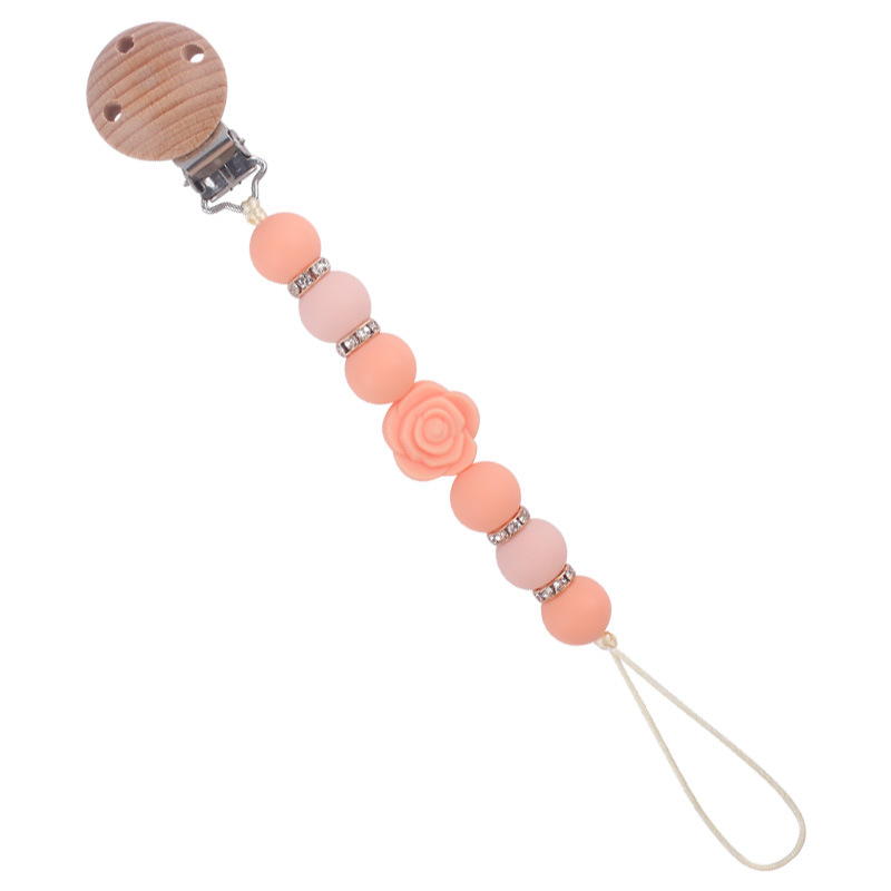 Nuevo bebé de dibujos animados de doble cara Rosa mordedor creativo DIY flash cuentas de ladrillo silicona mordedura pezón cadena anti-caída