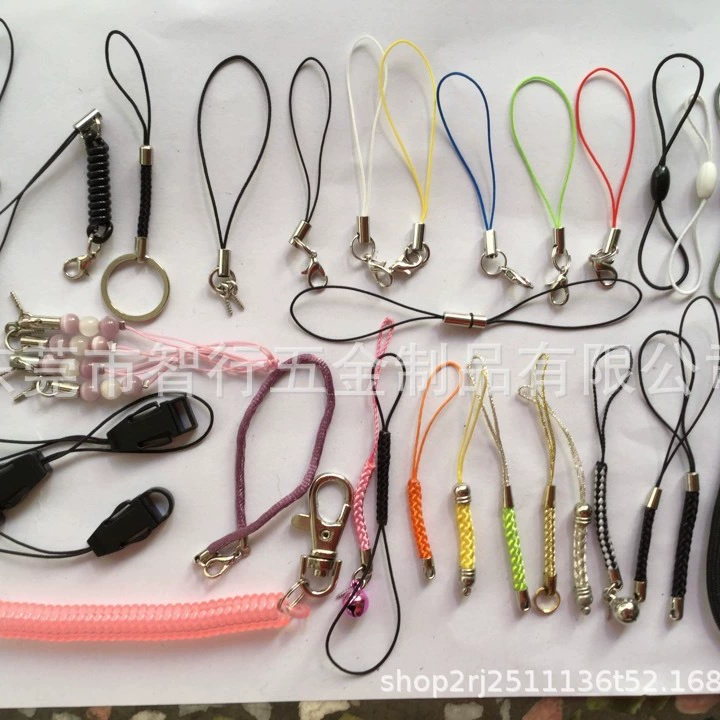 Black mobile phone, silicone strap, cards, USB flash drive, pendant