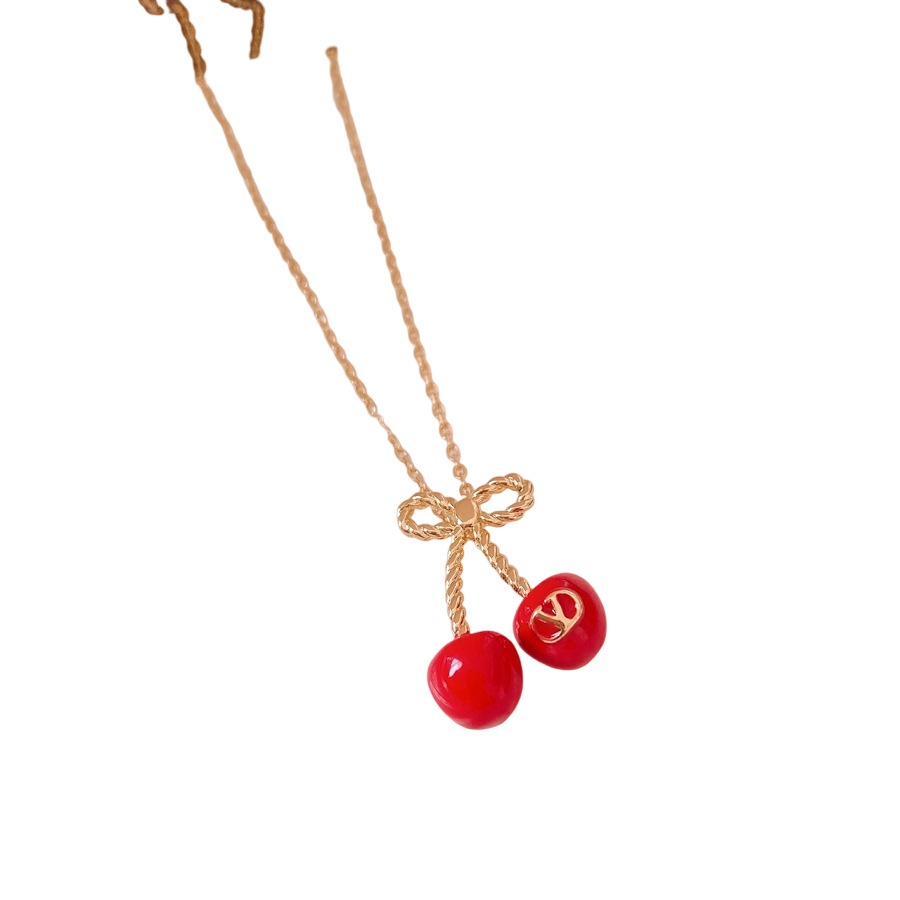 Aguja de plata, arco, letras de cereza, pendientes, collares frescos y dulces, cadenas de clavícula, temperamento de nicho, joyería femenina, sentido superior.