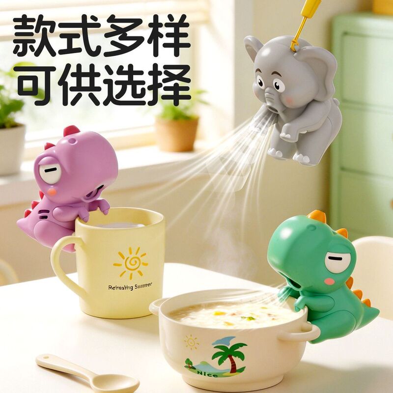 Little dinosaur fan for cooling rice and soup, cute little elephant design, portable, can be hung on a cup, also used for blowing hot water, a decorative item and toy for feeding babies Little dinosaur fan for cooling rice and soup, cute little elephant design, portable, can be hung on a cup, also used for blowing hot water, a decorative item and toy for feeding babies
