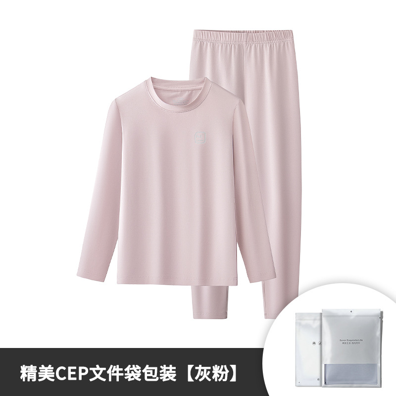 Conjunto de pantalones y tops térmicos finos de manga larga para niños y niñas de otoño e invierno de algodón modal, adecuado para salir o como pijama, color sólido, en stock.