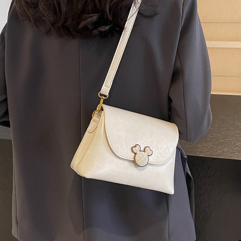 Este año, la popularidad de bolsos retrógrados para mujeres 2024 otoño y invierno nuevo bolso cuadrado de textura superior, bolso de mochila simple