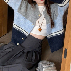 撞色拼接针织开衫女2025年秋新款百搭宽松毛衣外套慵懒上衣