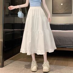 白いスカートの女性の夏 2025 春と秋の新作プリーツロングスカート妖精ケーキスカート
