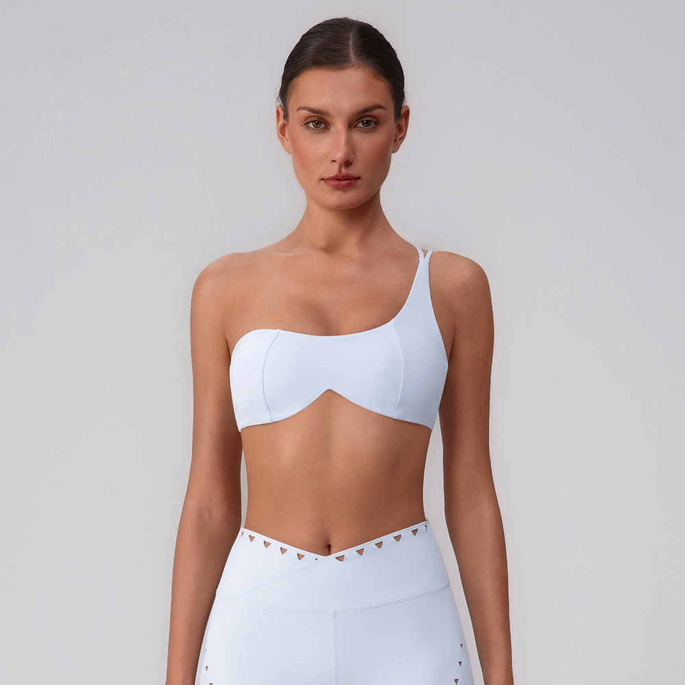 Sujetador de yoga hueco europeo y americano, almohadilla para el pecho desmontable de secado rápido, ropa interior deportiva, ropa de fitness Pilates, top de un hombro para mujer