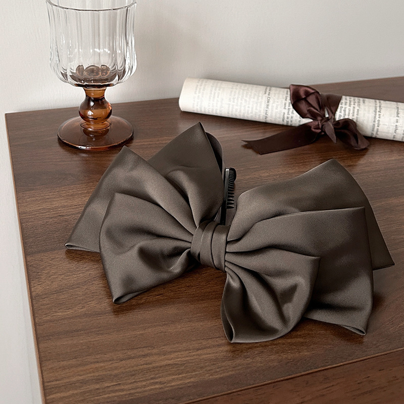 Fermaglio a banana con fiocco in raso elegante accessorio_voghion.com
