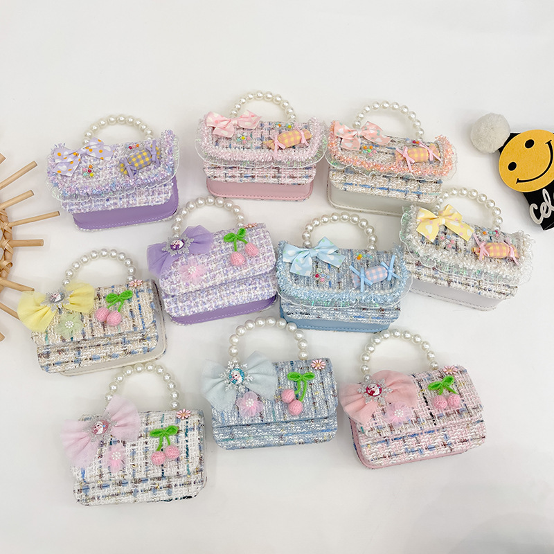 Nuevo bolso de mensajero de La Niña de los niños niña estilo de Chanel estilo occidental Linda niña linda de dibujos animados portátil pequeña bolsa