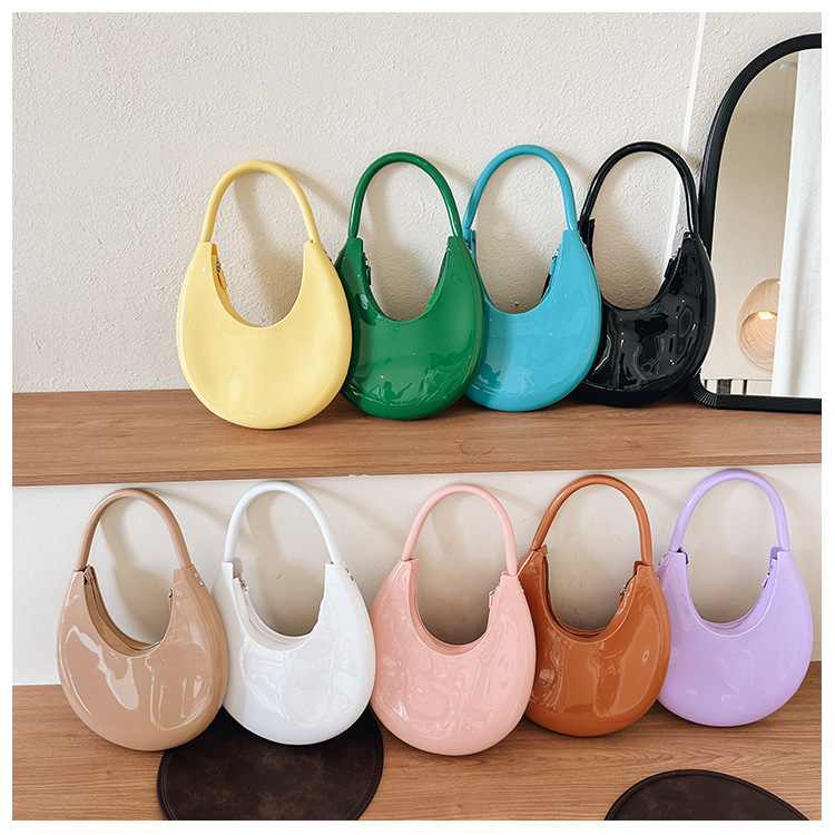 2025 New Fashionable Meniscus Hand-Held Jelly Bag Pvc Trendy Shoulder Hand-Held Women's Bag Casual Patent Leather Bag