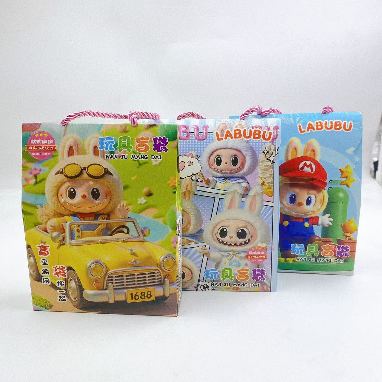 Juguetes infantiles de dibujos animados bolsas ciegas de mano nueva caja ciega bolsas de regalo papelería pegatinas regalo jardín de infantes premios al por mayor