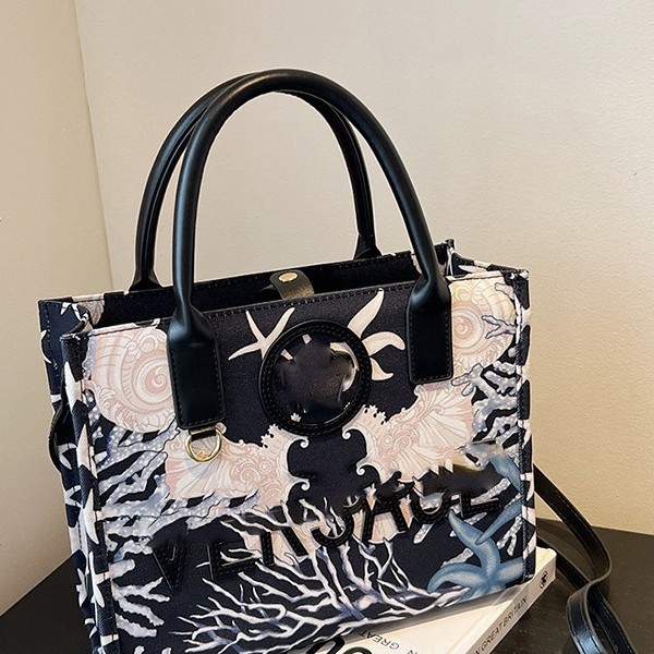 Bolsos bordados de gran capacidad para damas 2025 nuevo estilo de moda de alta calidad bolso de hombro de todo fósforo bolso transfronterizo portátil