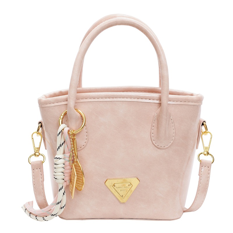 Bolso de mano de moda versátil para mujeres 2025 nuevo color de contraste de moda de un solo hombro bolso de cubo de alta sensación de mochila casual