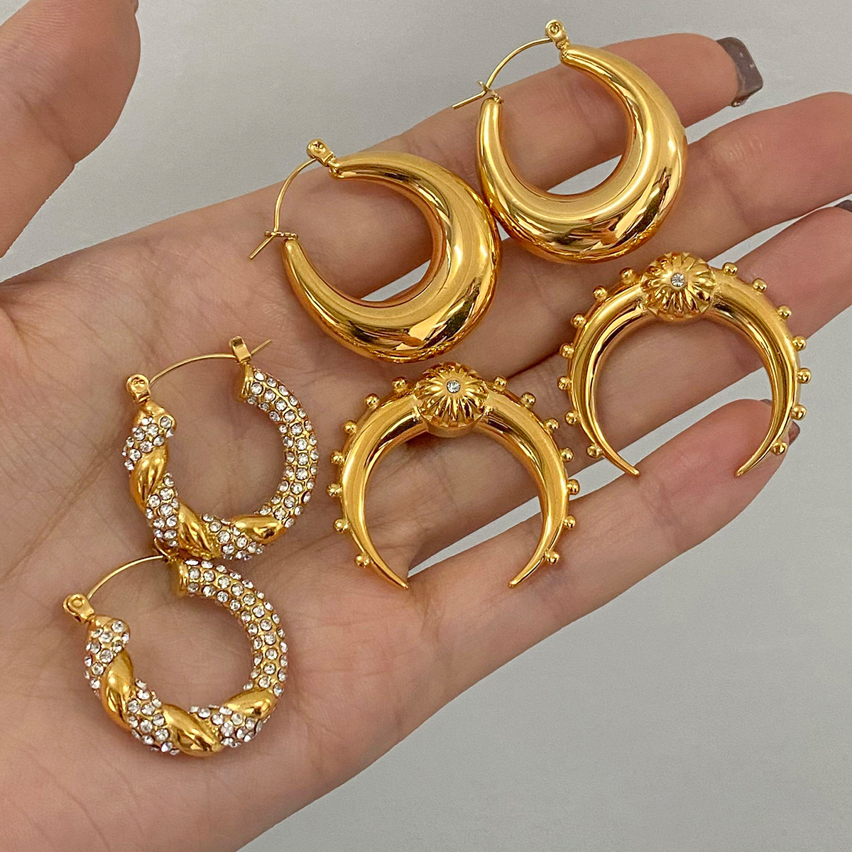 Jieding Pendientes de doble c de acero inoxidable europeo y americano Pendientes de circón de alta calidad