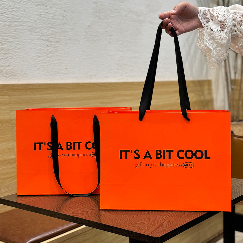 High-value orange clothing store handbag in stock high-end light luxury ins style gift bag foreign trade paper bag customization